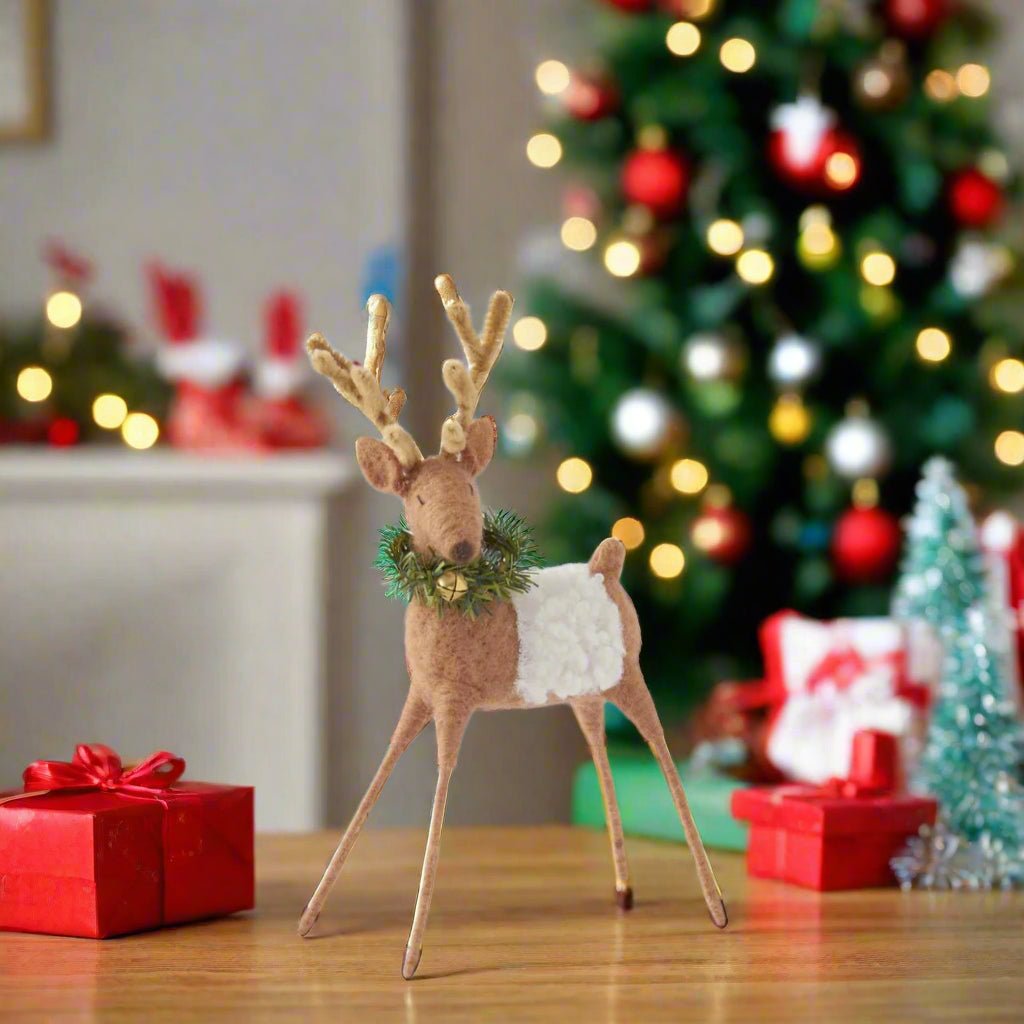 Primitive Farmhouse Christmas 8.25" Tan Wool Reindeer with Wreath and Bell - The Primitive Pineapple Collection