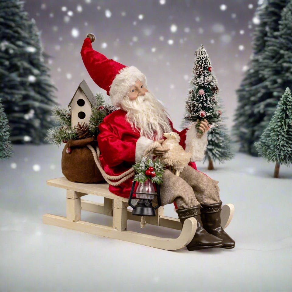 Ragon House 13” Vintage Looking Santa on Sled w/ Red Coat and Lantern - The Primitive Pineapple Collection