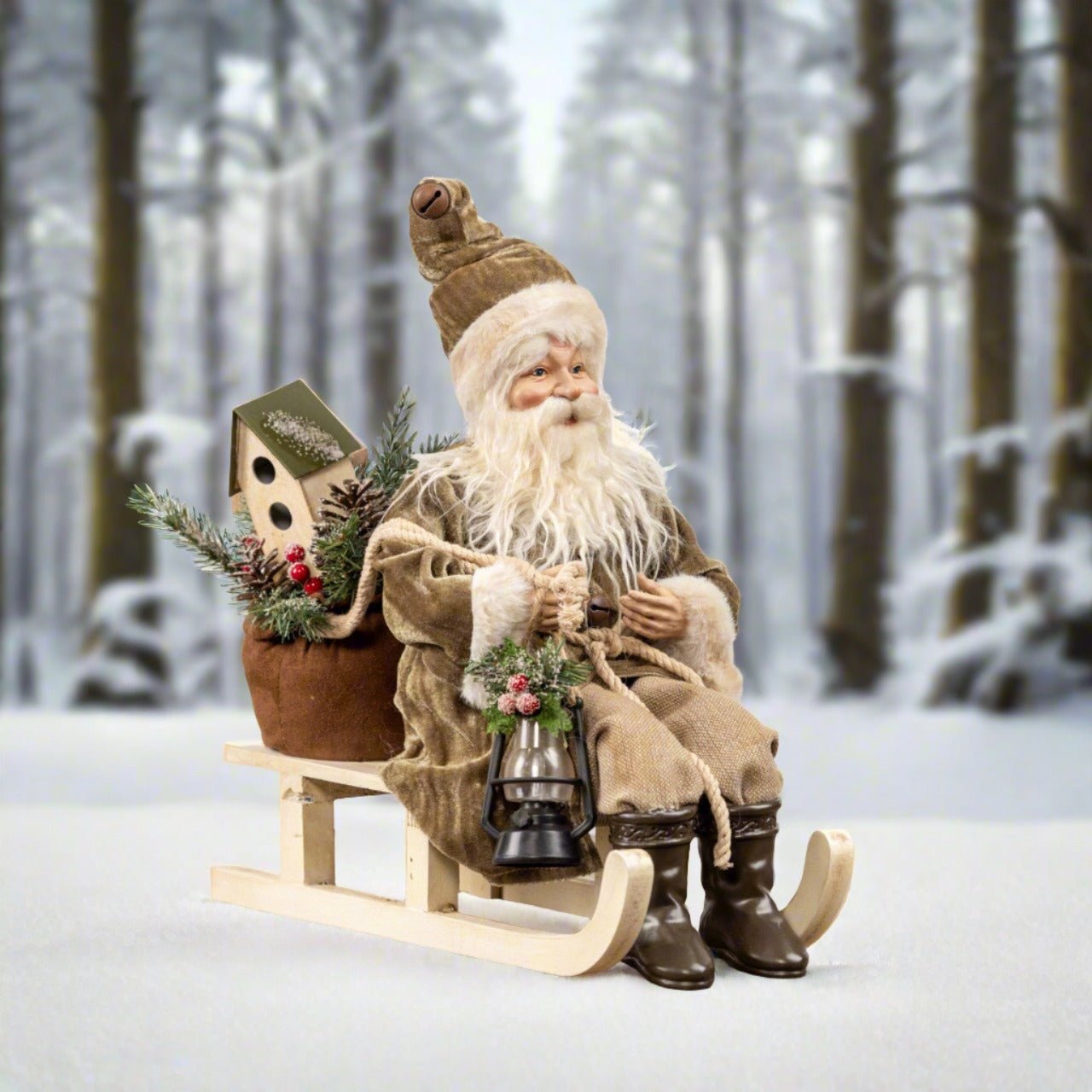 Ragon House 13” Vintage Looking Santa on Sled w/ Olive Green Coat and Lantern - The Primitive Pineapple Collection