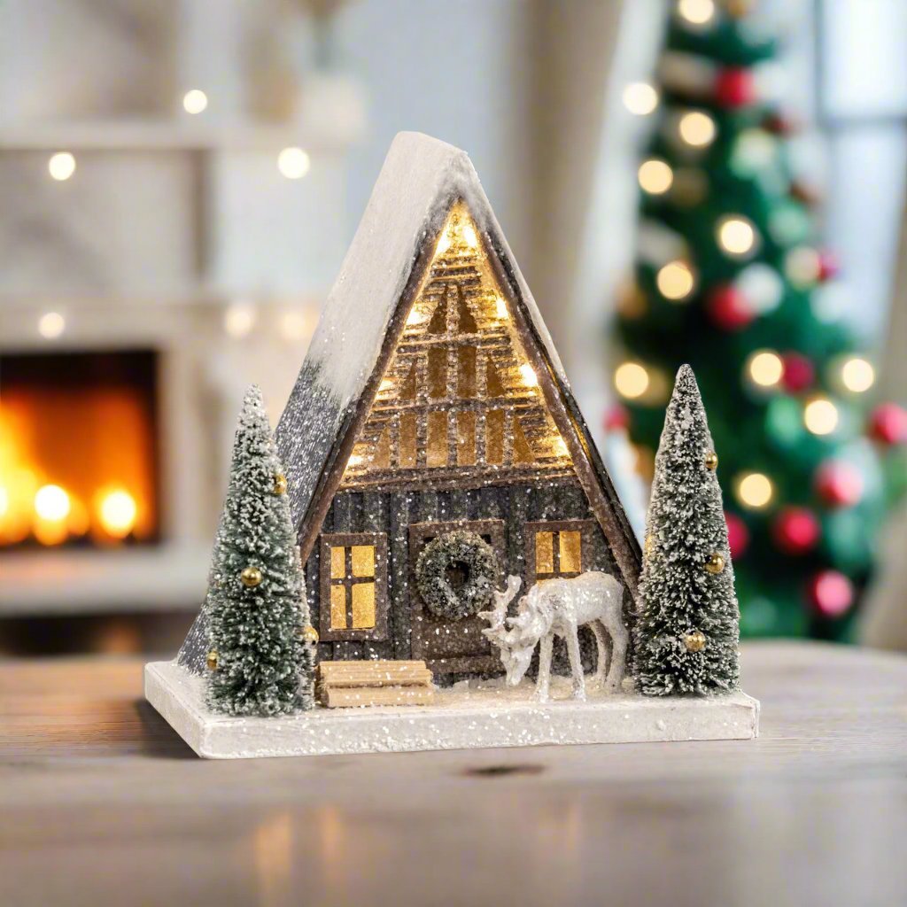 Ragon House Christmas Putz Style Light Up 8.75” Snowy A Frame Cabin w/ Deer - The Primitive Pineapple Collection