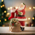 Bethany Lowe Christmas Santa Filling the Stocking TD4178 - The Primitive Pineapple Collection