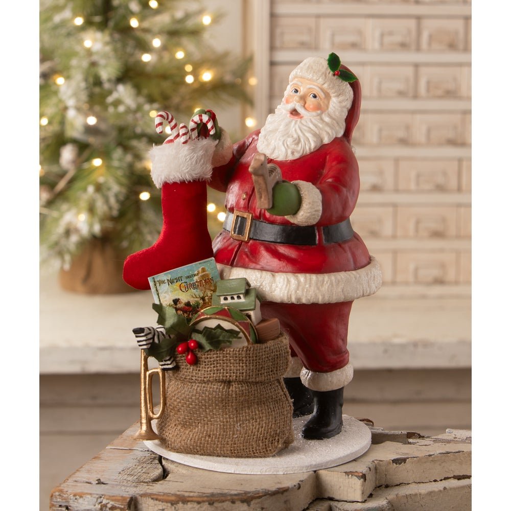 Bethany Lowe Christmas Santa Filling the Stocking TD4178 - The Primitive Pineapple Collection