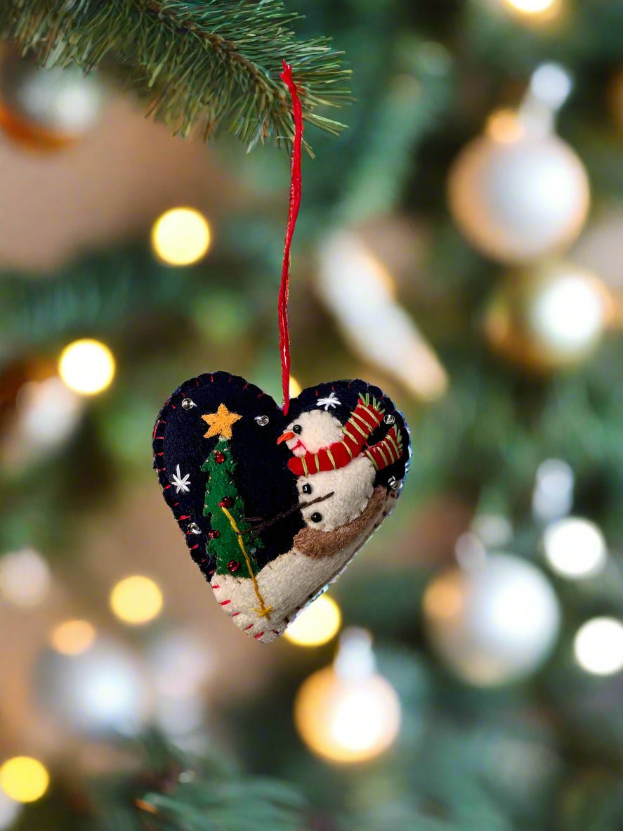 Primitive Christmas Handcrafted Felt 3” Blue Heart w/ Snowman Skiing Ornament - The Primitive Pineapple Collection