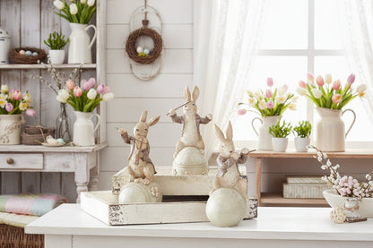 Farmhouse Spring Easter 8 Inch Brown Resin Musical Bunnies on Eggs 3 Designs - The Primitive Pineapple Collection