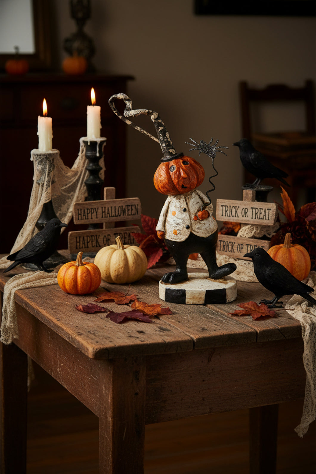 Folk Art Halloween 6" Resin Pumpkin Man Holding Black Spider Figurine