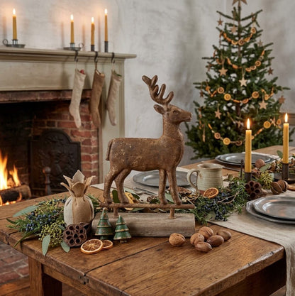 Ragon House 16" Primitive Distressed Metal Reindeer on Wood Base - The Primitive Pineapple Collection