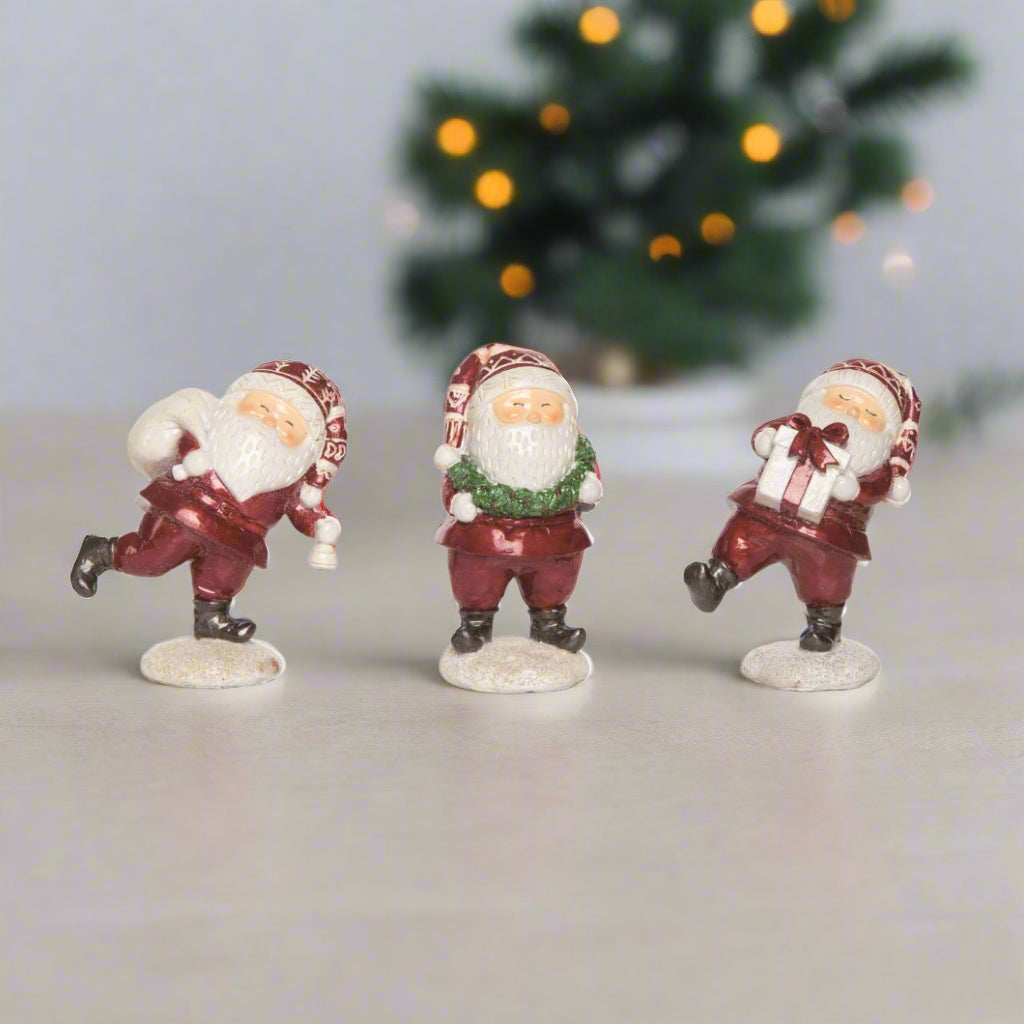 Primitive Christmas 3 pc Resin Jolly Santa Figurines