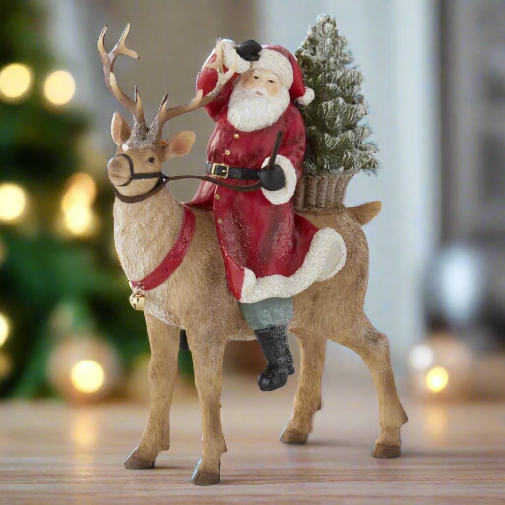 Collectable Christmas 10.5" Glittered Santa Riding Reindeer Figurine - The Primitive Pineapple Collection