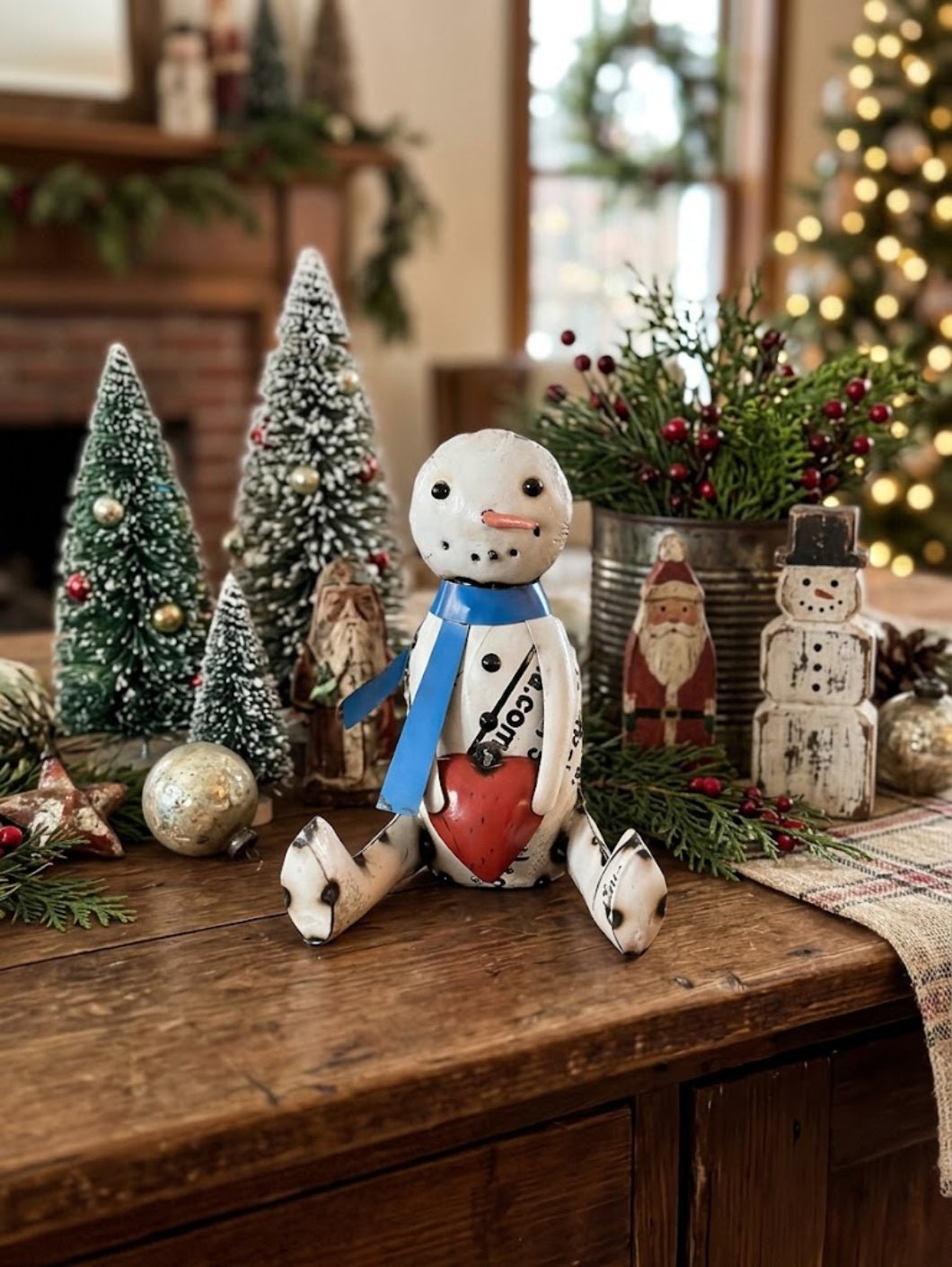 Primitive Christmas 8.75" Recycled Metal Sitting Snowman with Heart &amp; Scarf - The Primitive Pineapple Collection