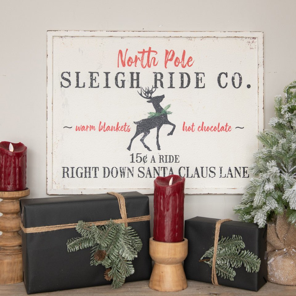 Ragon House Christmas 24” White Distressed North Pole Sleigh Ride Metal Sign - The Primitive Pineapple Collection